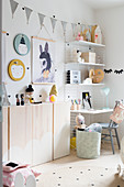 Desk in contemporary child's bedroom in pastel shades