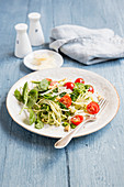 Spaghetti with pesto and cherry tomatoes