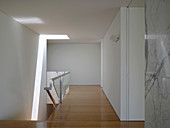 Landing and head of staircase in modern, minimalist, architect-designed house