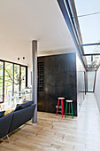 Cubist steel structure and skylights in open-plan interior of modern, architect-designed house