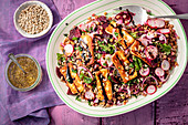Lentil, beetroot and red radish salad with fried halloumi