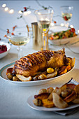 Duck wrapped in bacon filled with apples, pears and chestnuts