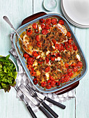 Ovenbaked fish with tomatoes
