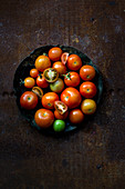 Various garden tomatoes on a plate
