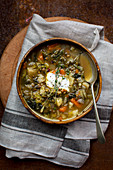 Lentil and vegetable stew with green kale, carrots and potatoes