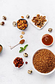 Morning food set with buckweat oats, various nuts and honey