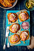 Potato and courgette fritters with smoked salmon and goat's cheese
