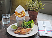Herb-fed chicken with hand-cut chips