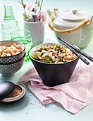 Asian rice noodles with beans, broccoli, cashew and sesame