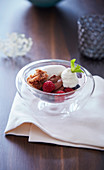 Marinated berries with chocolate cream, elderberry ice cream and nougat foam