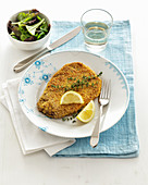 Pork collar escalope with a breadcrumb and sesame seed coating