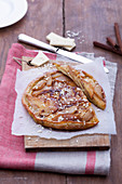 Sweet fruit omelette with white chocolate and cinnamon
