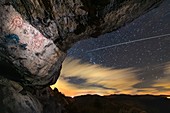 ISS light trail and prehistoric rock art, time-exposure