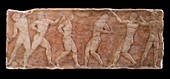 Painted reliefs of Greek athletes.