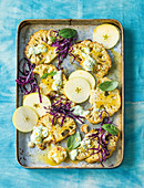 Roasted cauliflower with coconut and basil cheese sauce