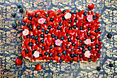 Strawberry and blueberry cake with flowers
