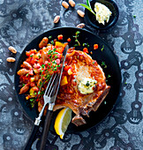Pork chops with beans and tomatoes