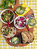 Tacos with aubergine cream and beetroot hummus
