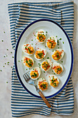Eggs stuffed with spiced egg yolks, paprika and chives
