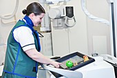 Radiographer with a mobile X-ray machine