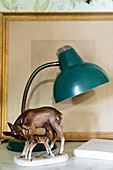Porcelain deer and kid, table lamps and picture frame