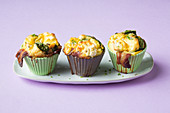 Fine egg muffins with spinach, bacon and feta cheese (keto cuisine)