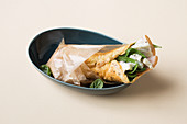 A ham wrap with gorgonzola and spinach (keto cuisine)