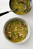 An egg mixture for frittata de pasqua (Easter omelette with innards, asparagus and ham, Italy)