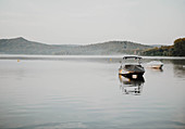 Two small motor boats on lake