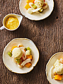 Thai fruit salad with a mango and coconut dressing