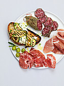 Antipasti plate with meath, prosciutto and salami
