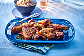 Glazed chicken wings with rice
