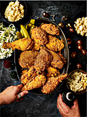 Breaded, fried buttermilk chicken drumsticks with bacon