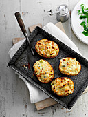 Double-baked jackets with creamy leeks and blue cheese