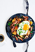 Duck confit hash and chilli-fried eggs