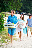 Family carrying packed picknick meals