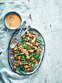 Roasted sweet potato Freekah harissa salad