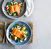 Hot home-smoked sea trout with potato and kale salad