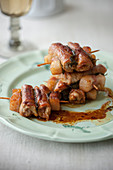 Veal roulade skewers with sage