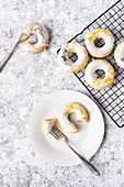 Lemon And Poppyseed Doughnuts With A Lemon Icing And Zest