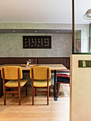 Digital wall clock in retro dining area