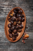 Sweet chestnuts in wooden bowl