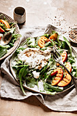 Summer salad with peaches and burrata