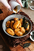 Healthy pumpkin gnocchi with brown butter and sage