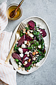 Beetroot and goats cheese salad with nuts and olive oil