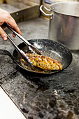 Roasting pork tenderloin with madeira and sage ina pan