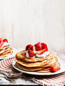 Coconut pancakes with strawberries and lime syrup