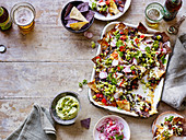 Nachos with chorizo and creamy guacamole