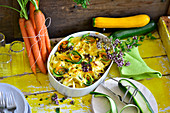 Pasta bake with zucchini and carrots