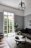 Two-tone wall in elegant living room in shades of grey